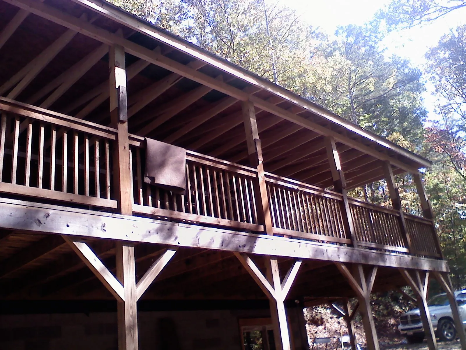 Timber framing under a new elevated porch and deck — Roof Leak Repair in Shingletown by Roofing Brothers